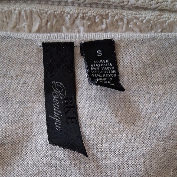 BKE Cream Off-the-Shoulder Sweater with Rosette Detail - Picture 2 of 5